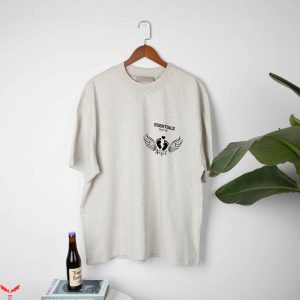 Cream Essentials T-Shirt The Foot Of Small Angel Tee Shirt