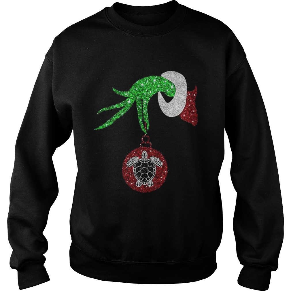 Grinch hand holding turtle ornament shirt Grinch hand holding turtle ornament shirt