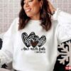 Love Never Fails Religious Leopard Valentines Day Unisex Sweatshirt Unisex T-Shirt