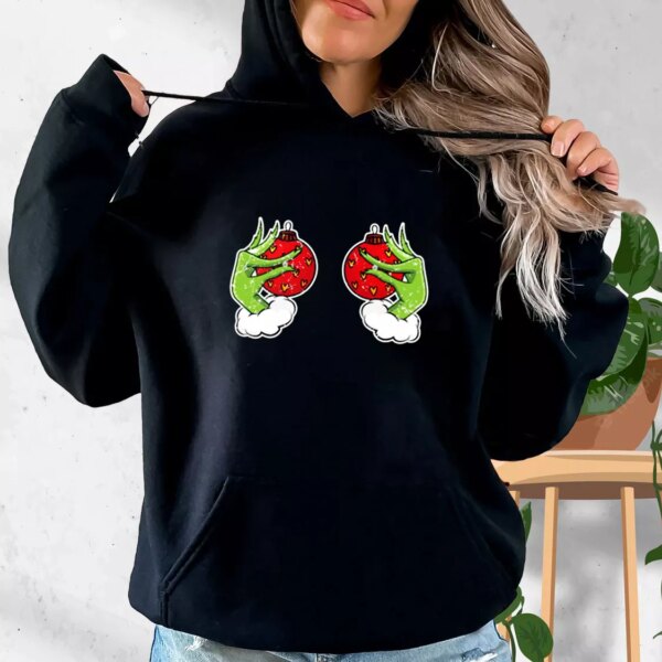 Funny Grinch’s Hand Is On The Breast Hoodie Xmas Outfits