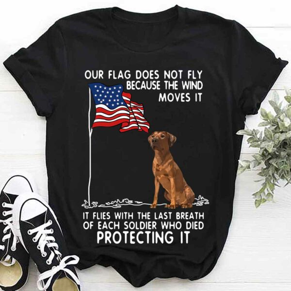 Our flag does not fly because the wind moves it it flies with the last breath – rhodesian ridgeback dog and America flag